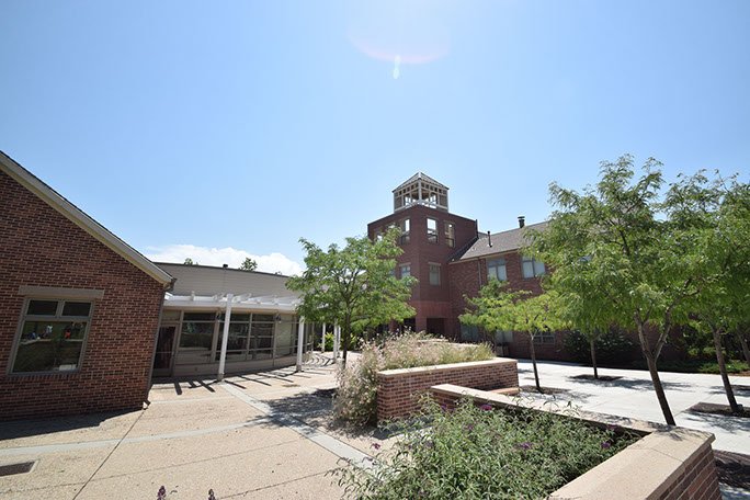 Rowland Hall-St. Mark's School plaza with trees and landscaping