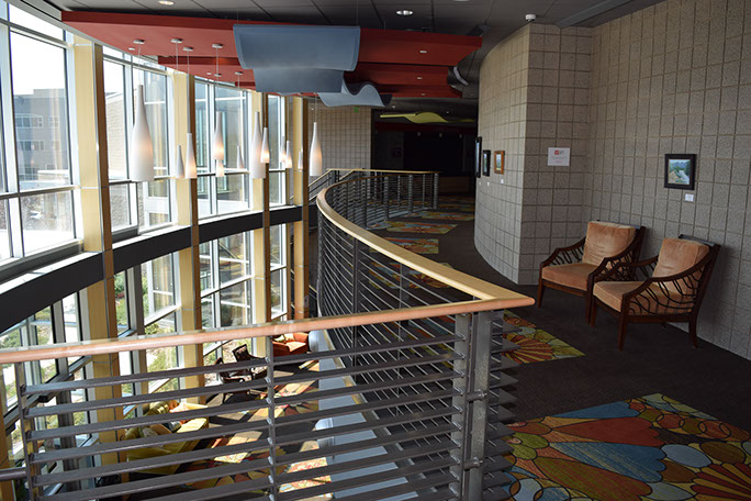 Davis Center for the Performing Arts atrium balcony with railings and window facade