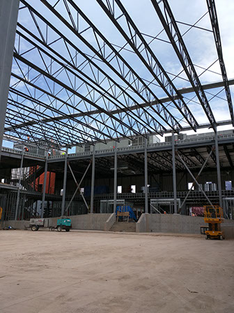 C. Mark Openshaw Education Center and Office Building trusses over gym and exposed x-braces